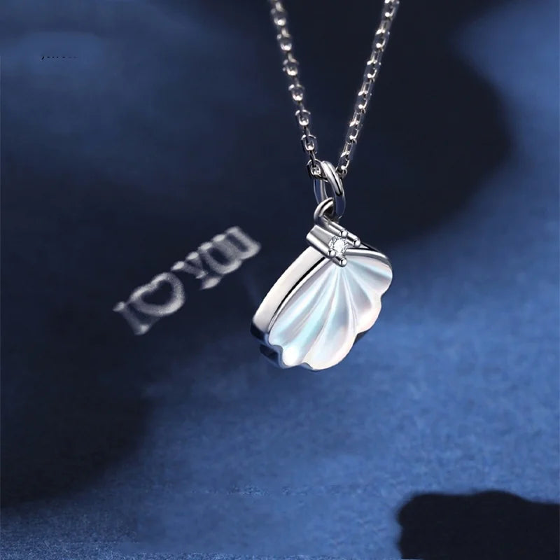 Silver Shell Necklace with Hidden Projection