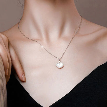 Silver Shell Necklace with Hidden Projection